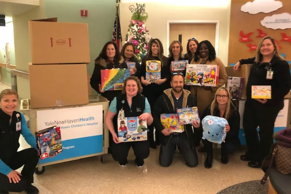 Members of the North America Legal Team collaborated to donate three boxes of toys and lift the spirits of kids at the Yale New Haven Children’s Hospital.