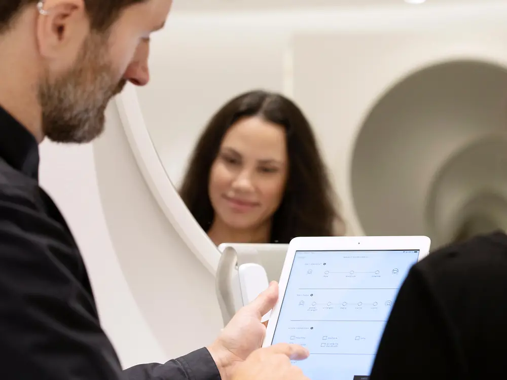 A hairdresser shares insights from the SalonLab Consultant App with consumer.