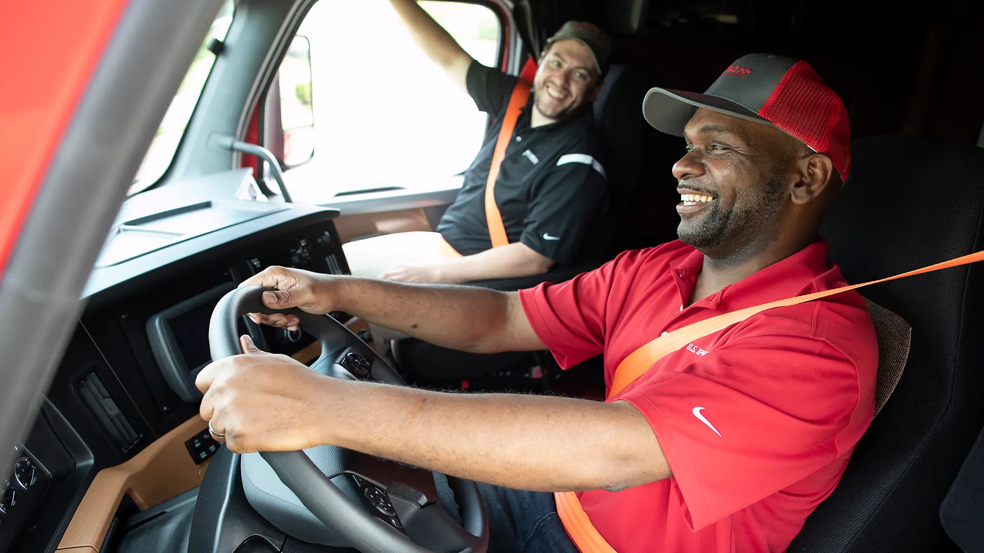 photos of various trucks and drivers smiling inside truck cab