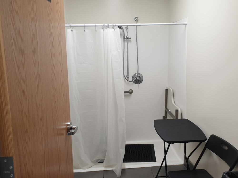 photos of distribution point amenities for truck drivers, including kitchens and showers