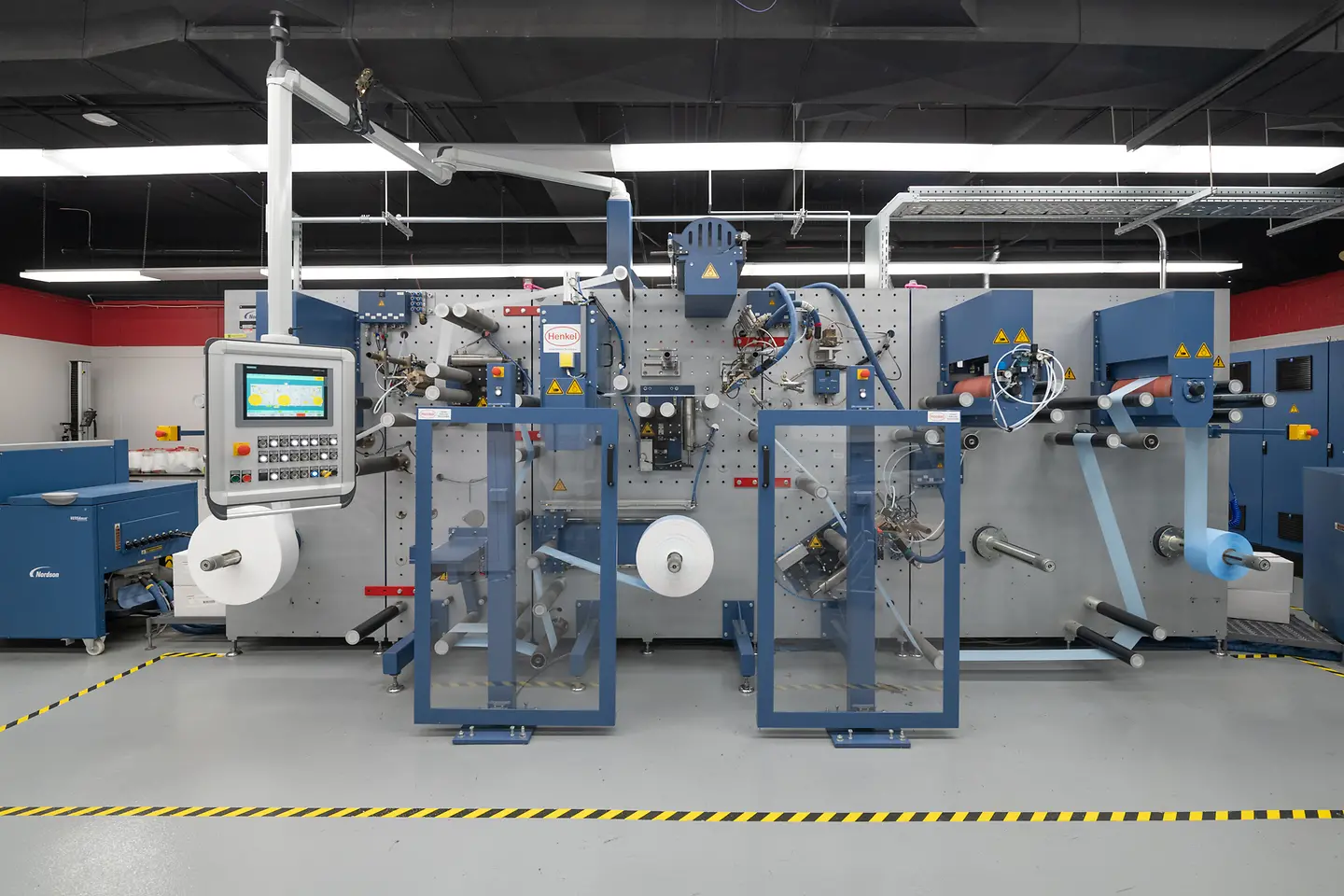 A nonwovens single and dual lamination hygiene coater in a lab at the Technology Center Bridgewater.