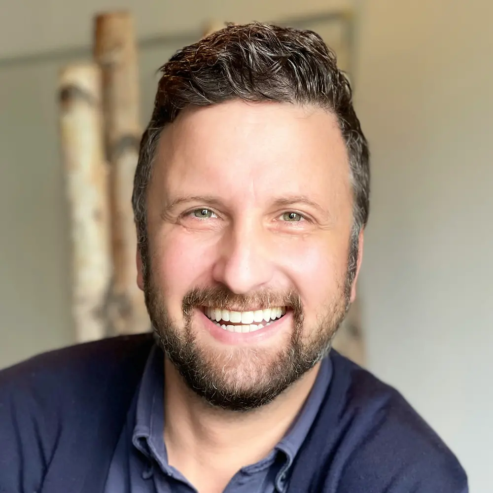 A portrait of a man who is a Partner OEM Director.