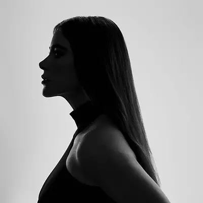 Black and white female face silhouette facing to the side
