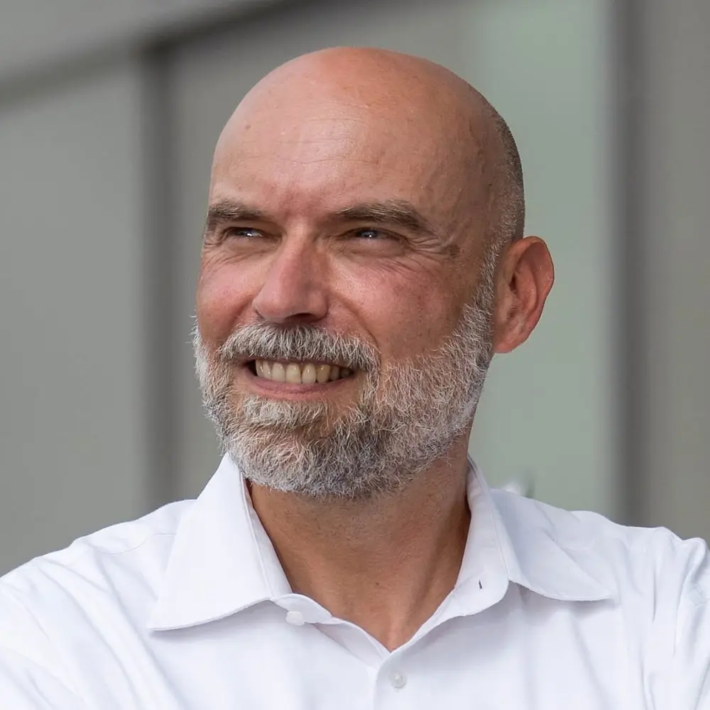 A portrait photo of Alexander Klar, Senior Manager Transaction Services at Henkel 