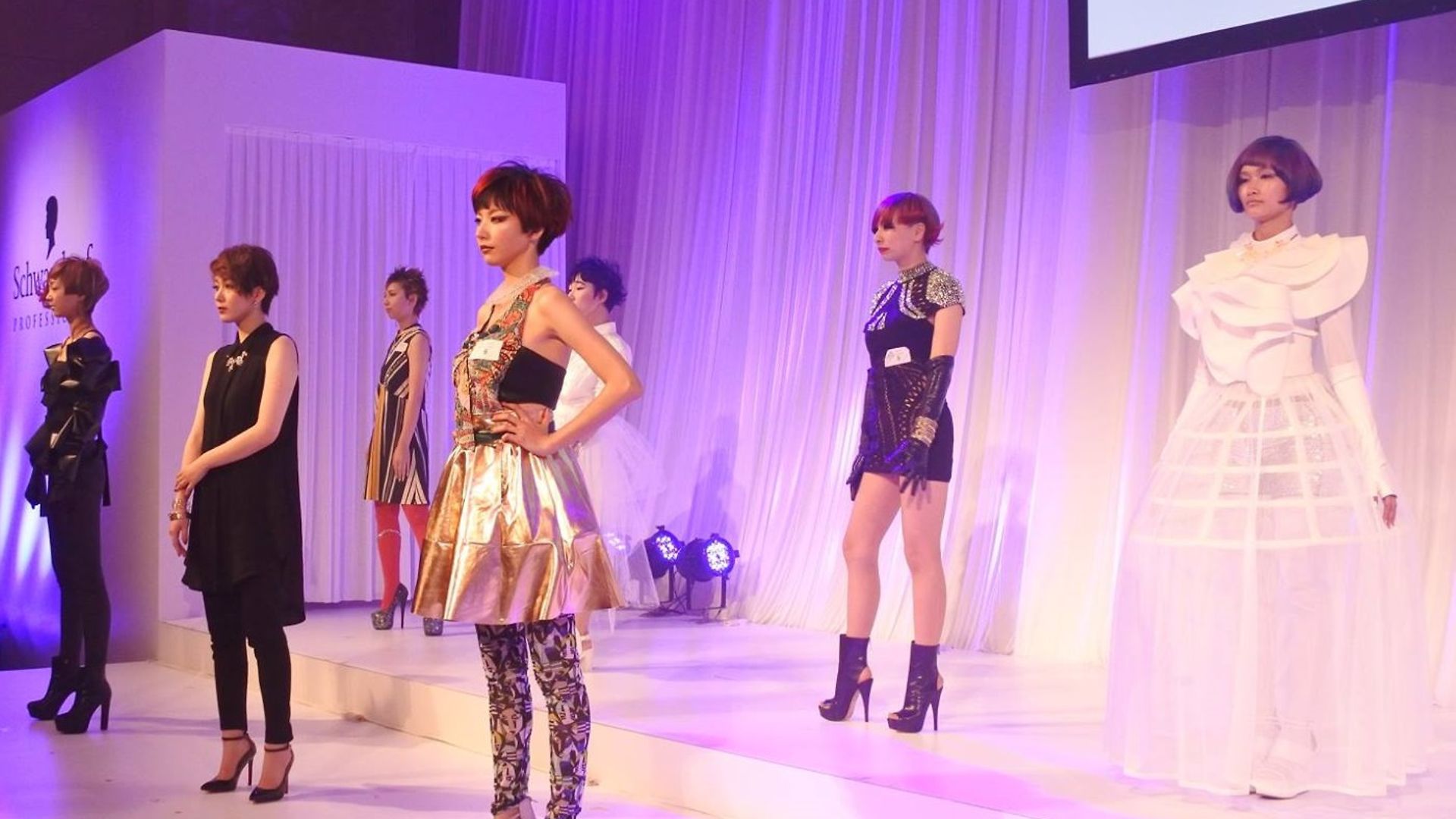 The models presenting the hairstyles