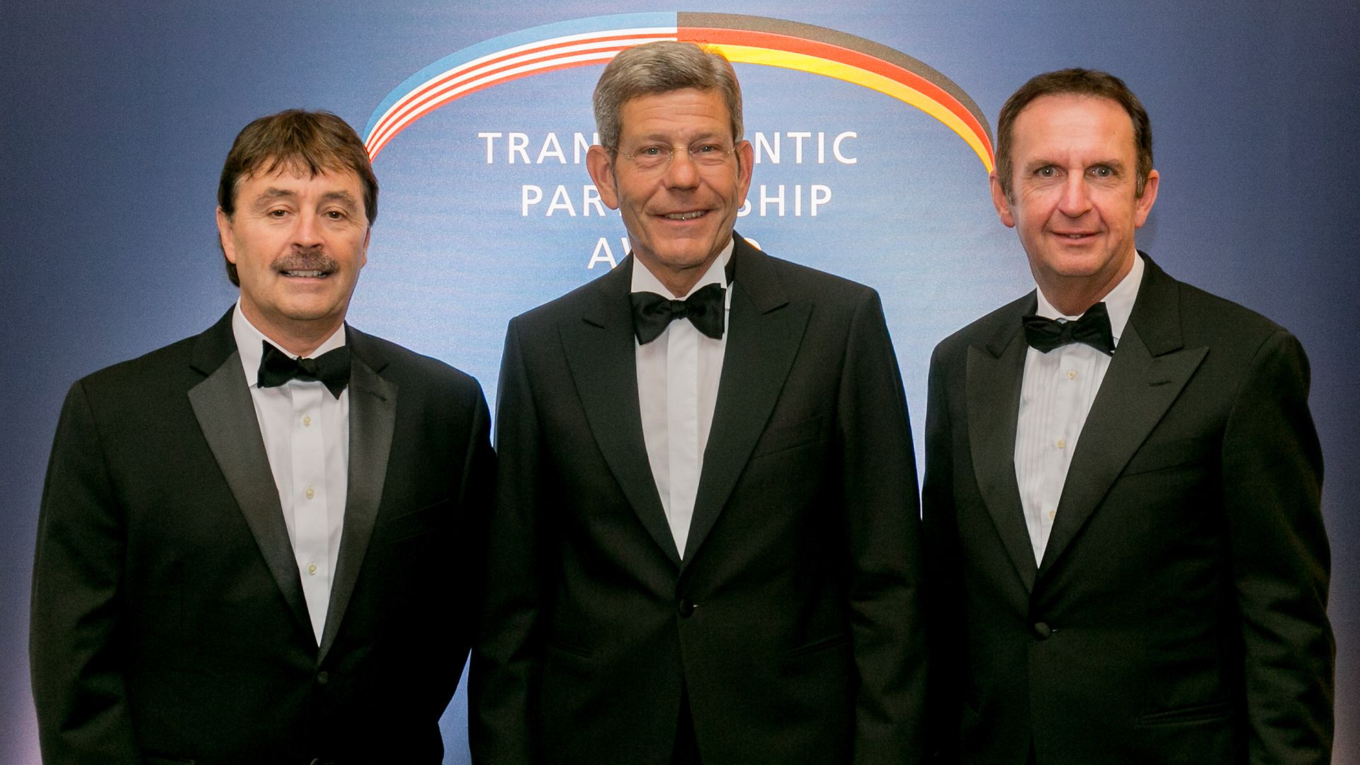 Henkel CEO Hans Van Bylen (r.), Jerry Perkins (l.), Bernhard Mattes