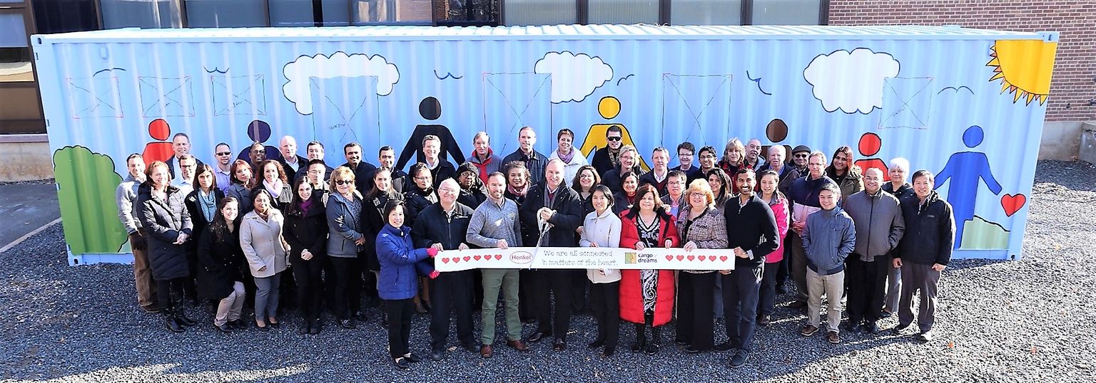 Bridgewater employees celebrate the completion of the Cargo of Dreams construction 