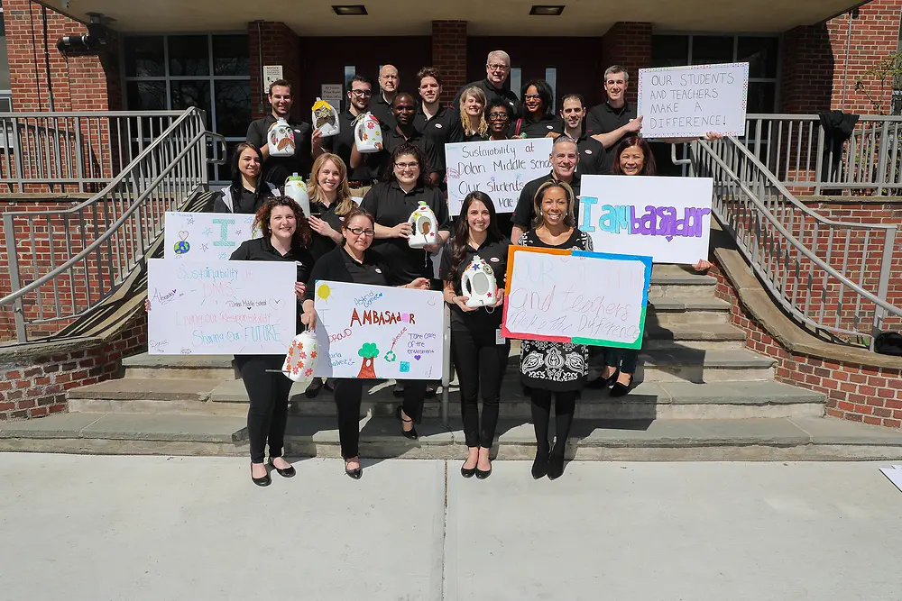 Henkel Sustainability Ambassadors from Stamford and Trumbull, Conn. in front of Stamford's Dolan Middle School following a successful afternoon of interactive sustainability education.