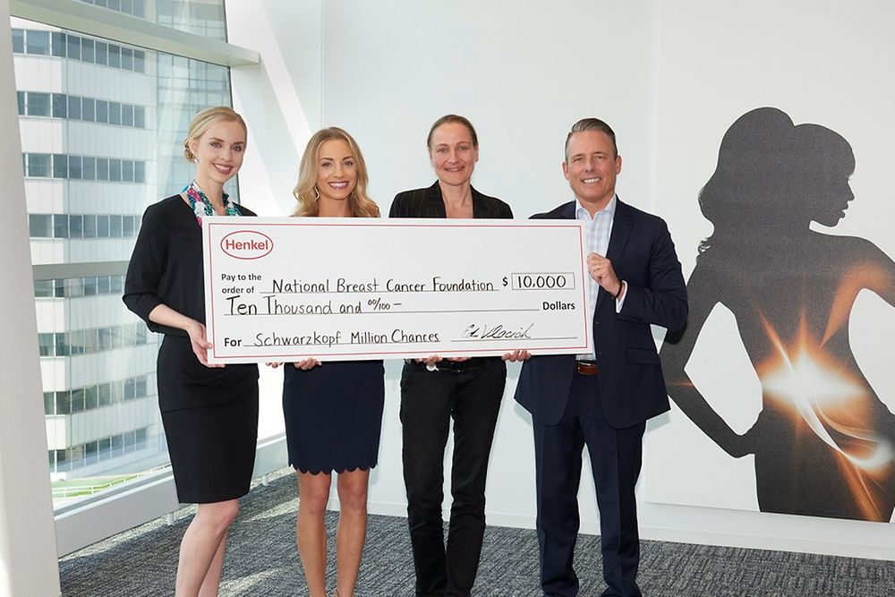 Danae Johnson, Senior Director of Development, and Kara Causey, Corporate Partner Manager for National Breast Cancer Foundation, accept a donation from Xenia Barth, Henkel's North America Vice President of Marketing, Hair; and Ed Vlacich, North America Region Head, Henkel Beauty Care, to kick off the partnership between the organizations as part of the company's Schwarzkopf Million Chances initiative.