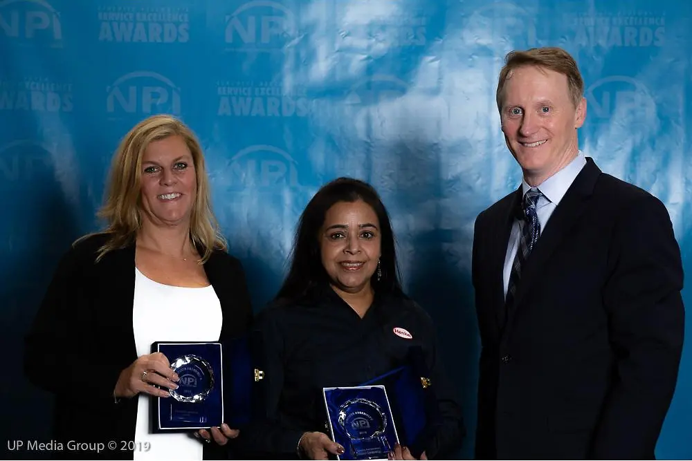(From L to R) Henkel’s Chris Maksud, Regional Sales Director Automotive Electronics, and Rita Mohanty, Director of Technical Customer Service,Thermal, accept NPI Awards from Circuits Assembly magazine Editor-in-Chief, Mike Buetow.