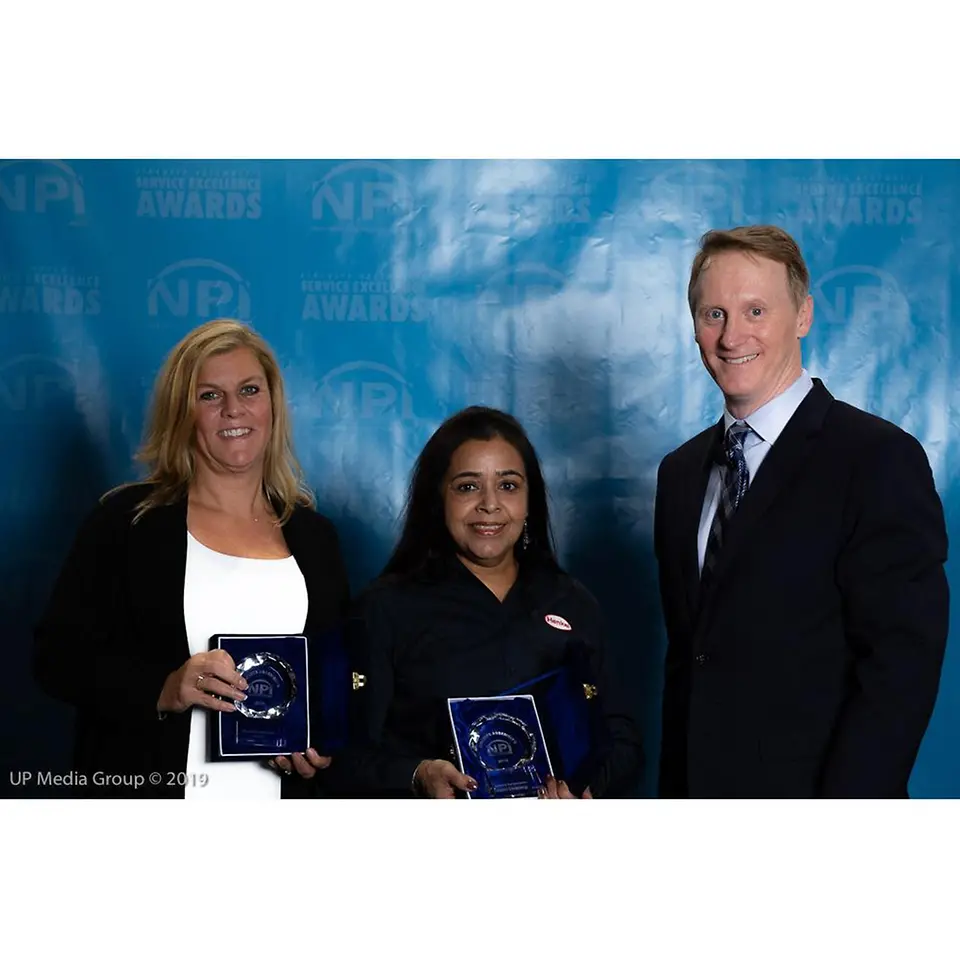 (From L to R) Henkel’s Chris Maksud, Regional Sales Director Automotive Electronics, and Rita Mohanty, Director of Technical Customer Service,Thermal, accept NPI Awards from Circuits Assembly magazine Editor-in-Chief, Mike Buetow.