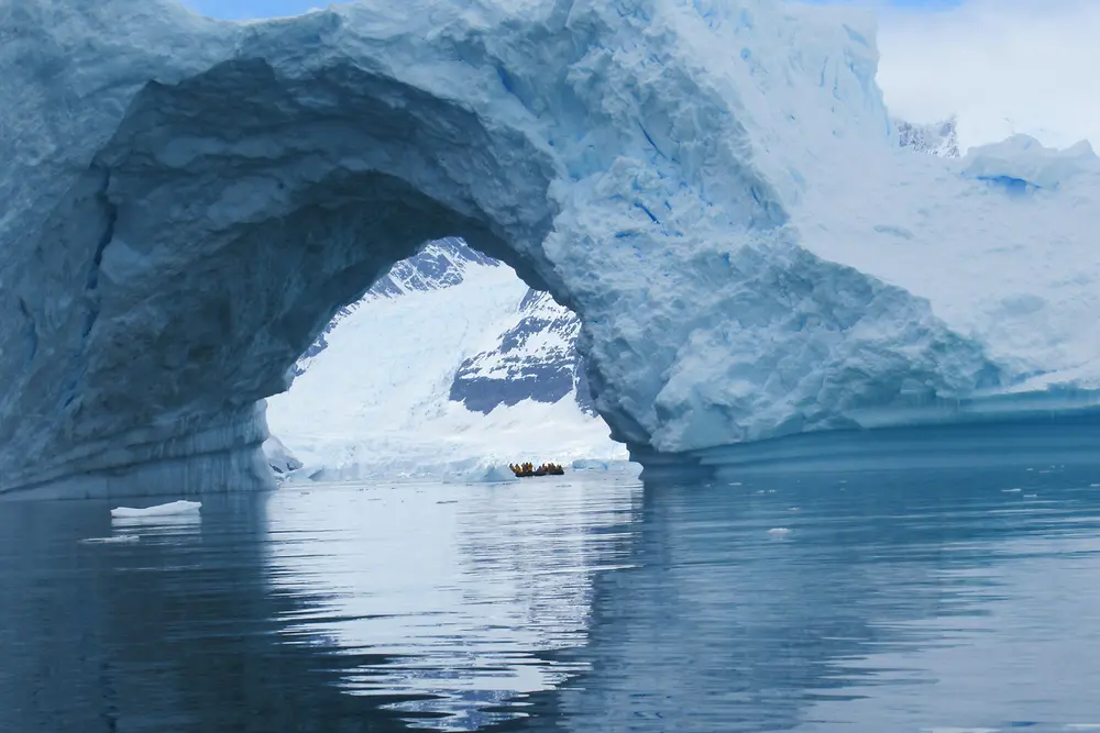 Traveling aboard zodiac boats provided expedition passengers with opportunities to float among massive blue iridescent icebergs that constantly effervesce as they emit forced air bubbles.