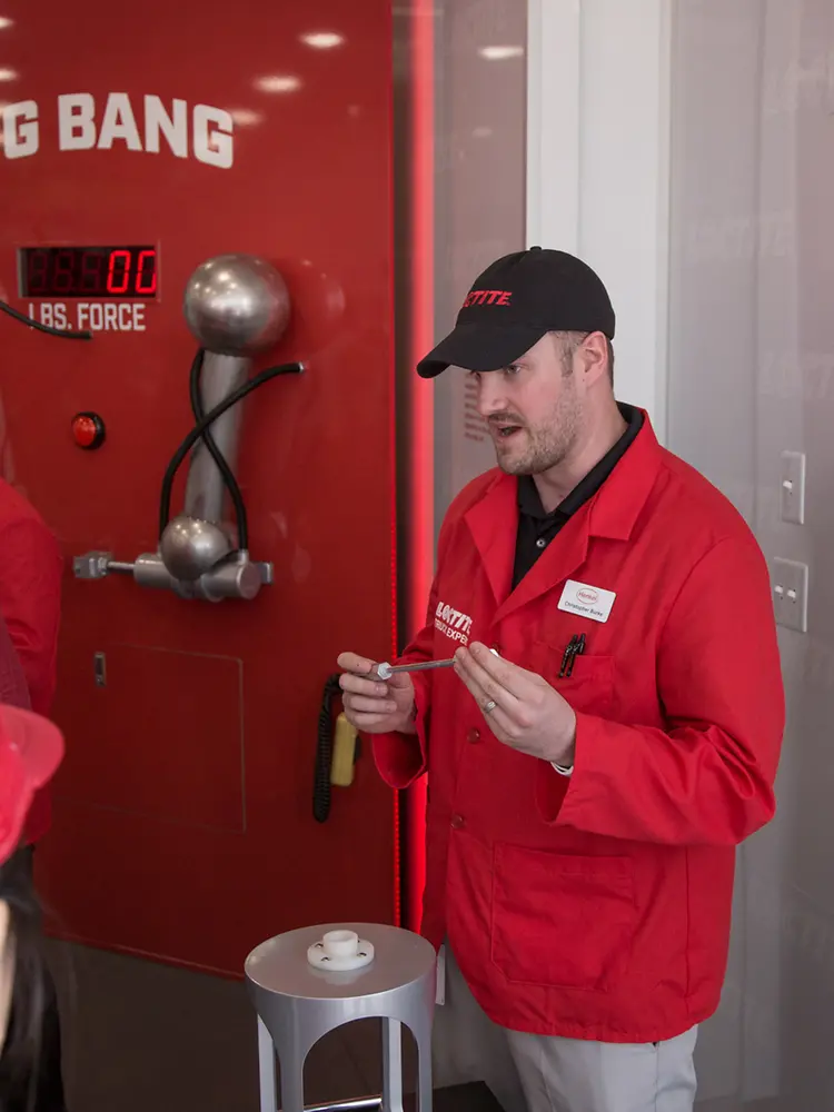 Henkel’s Chris Burke facilitates the Loctite “Big Bang” demo showing the incredible bond strength of LOCTITE hybrid adhesives.